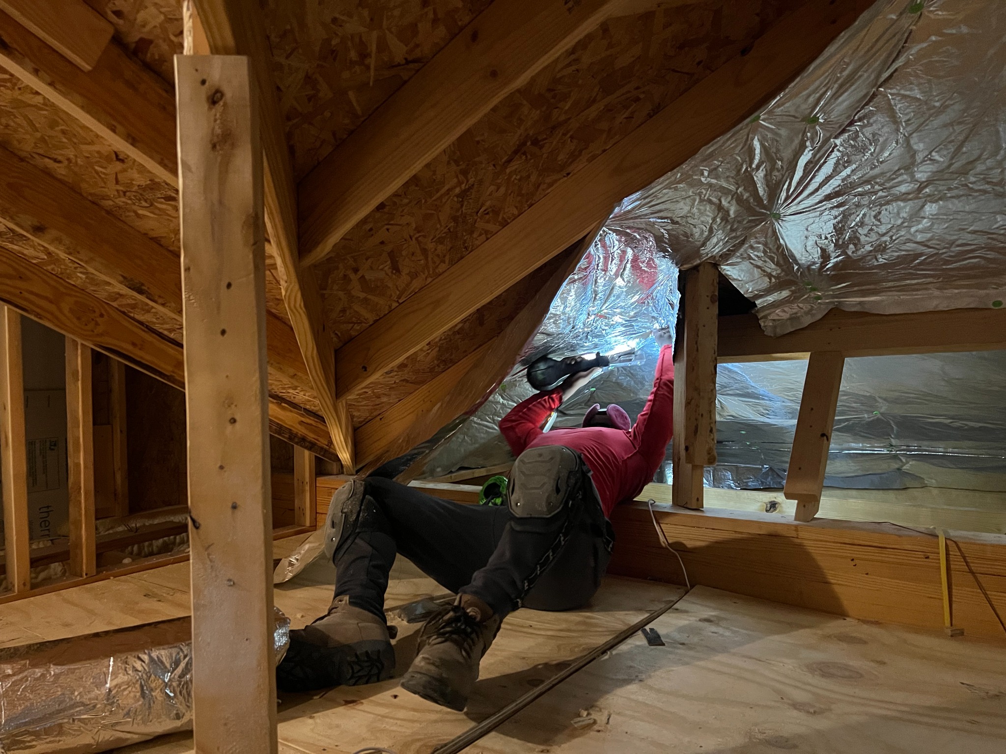 Radiant barrier installation inside a residential attic